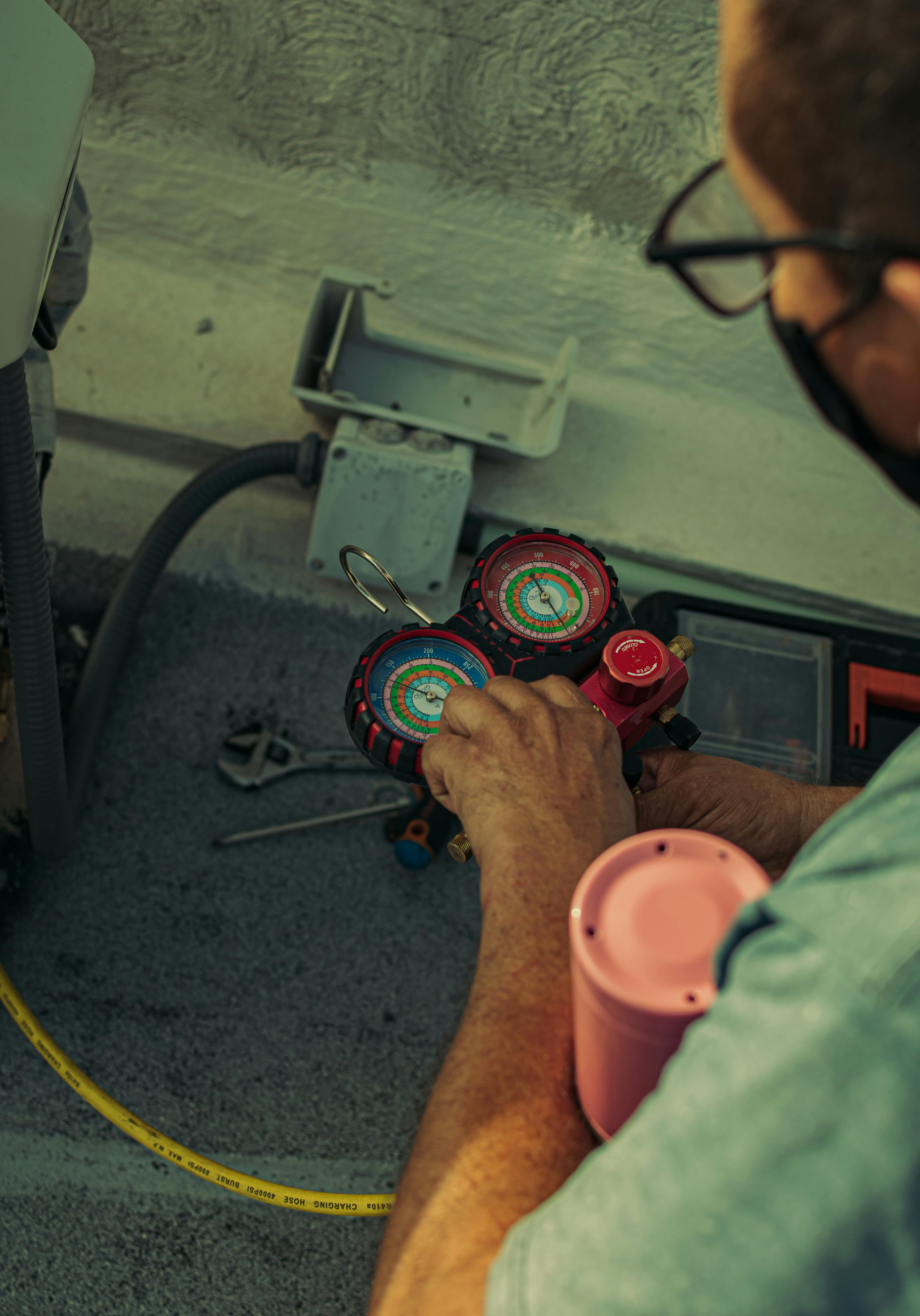 HVAC gauge check during outdoor service