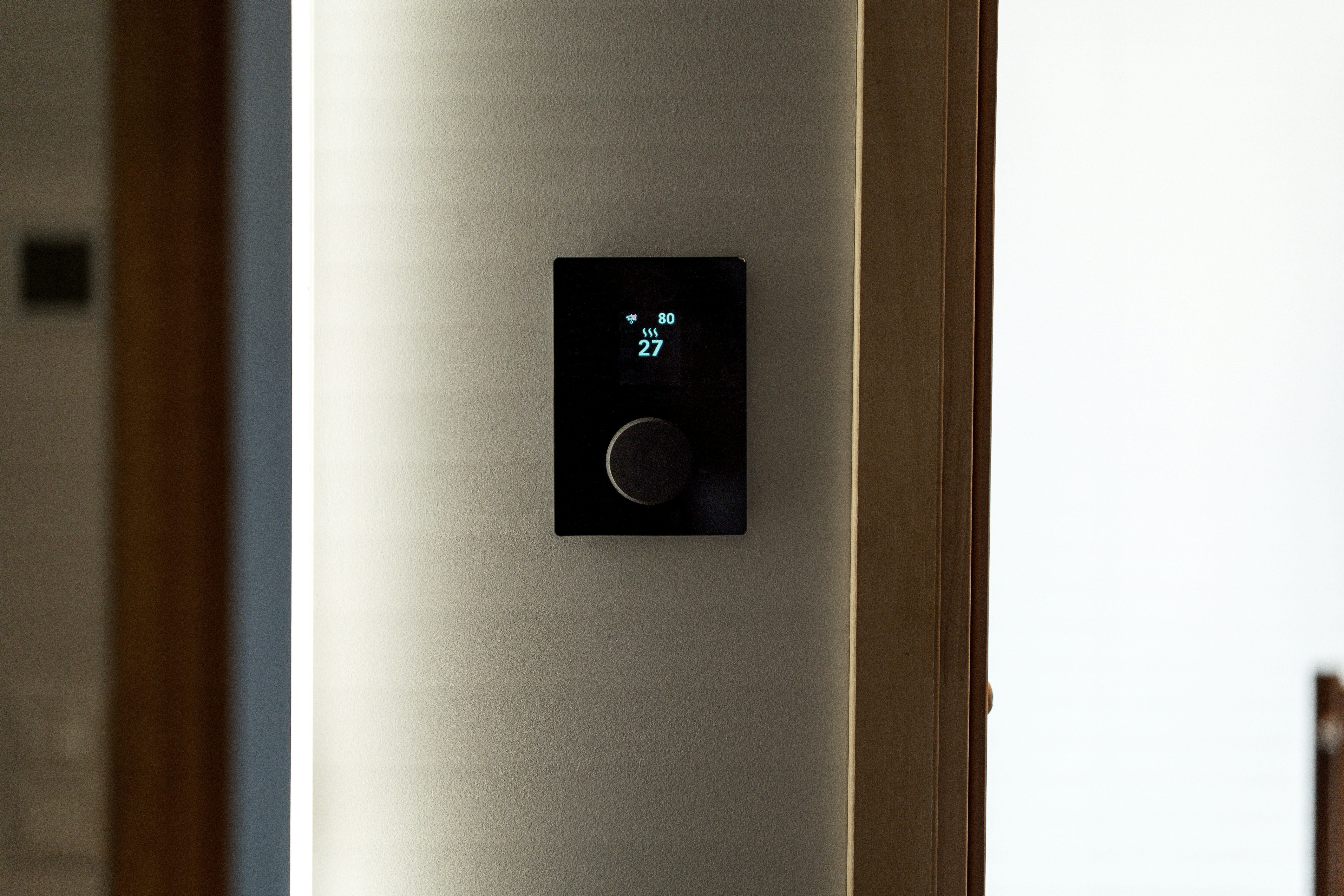 Thermostat mounted inside a home